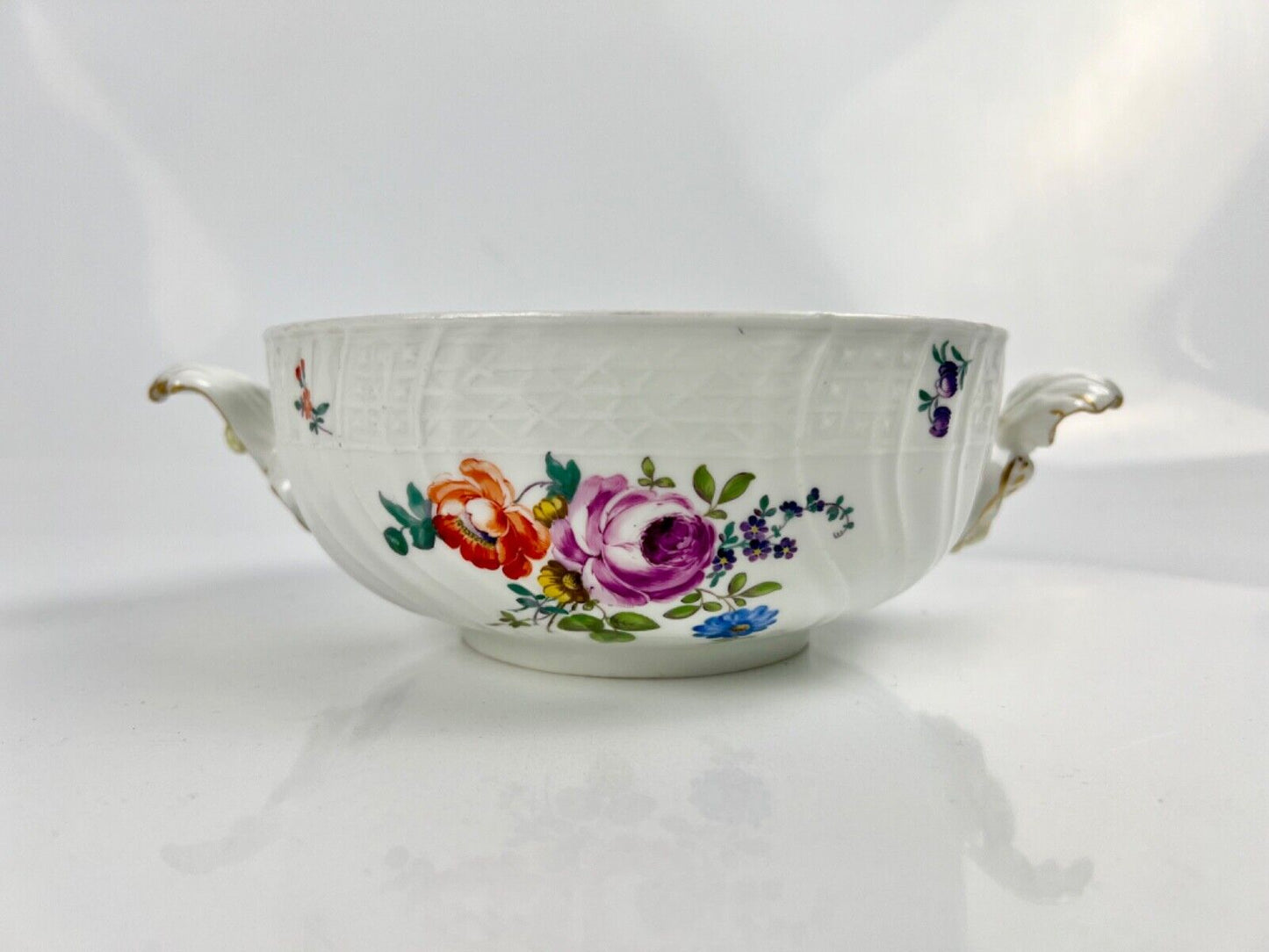 A Meissen Academic Dot Period figural and asparagus handled moulded tureen c1770