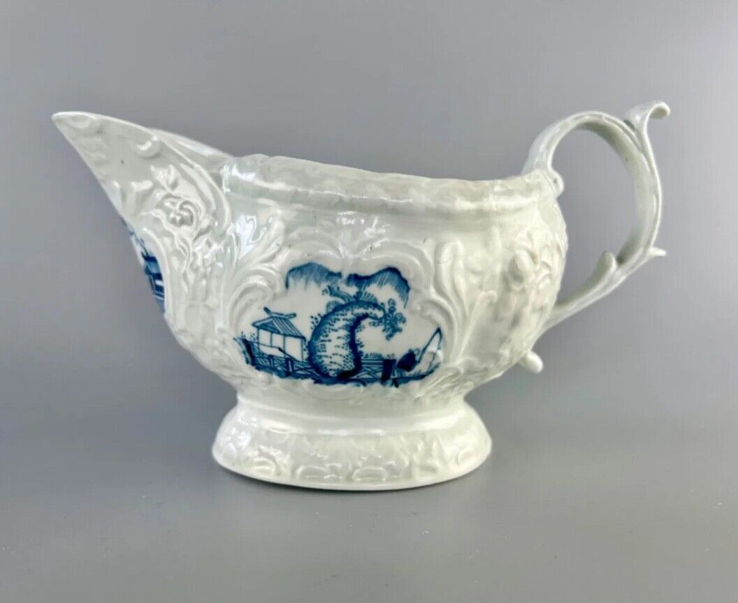 Christian Liverpool porcelain moulded sauceboat with oriental decoration. c.1770