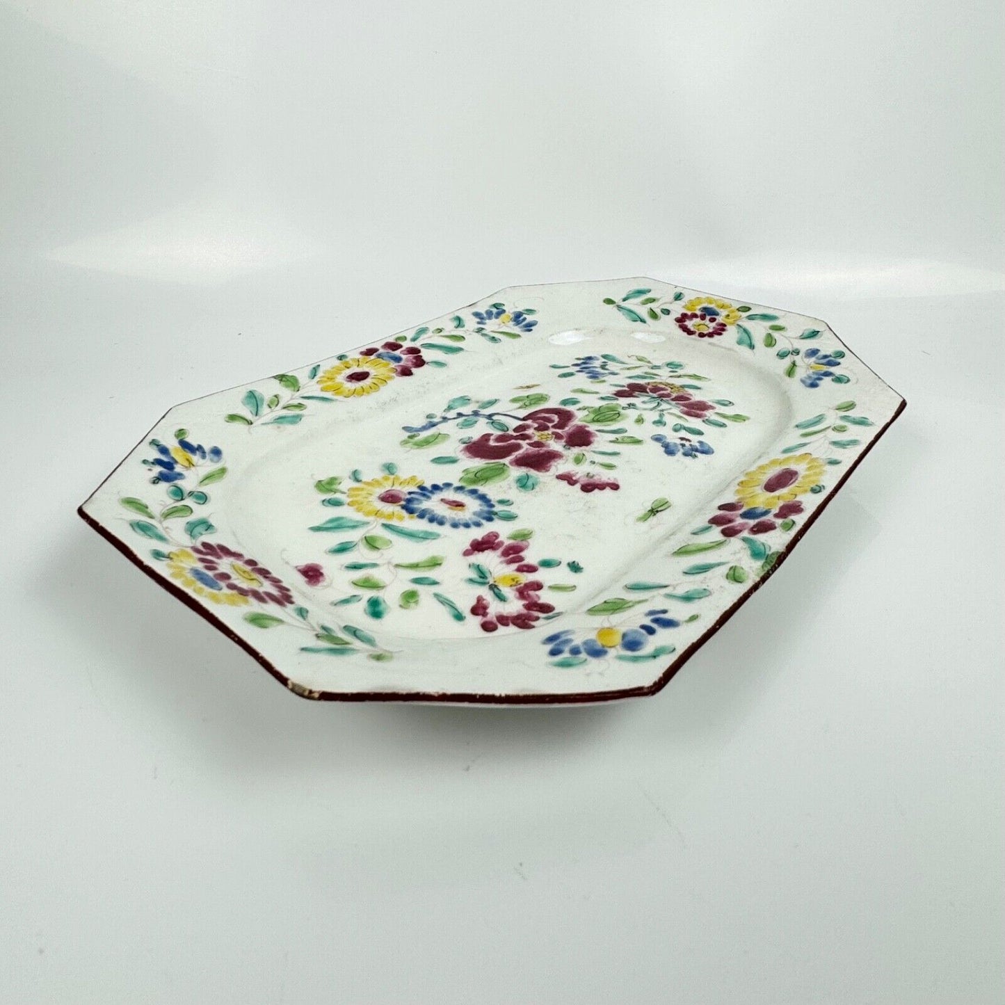 A small Bow platter painted in famille rose style c.1750-5