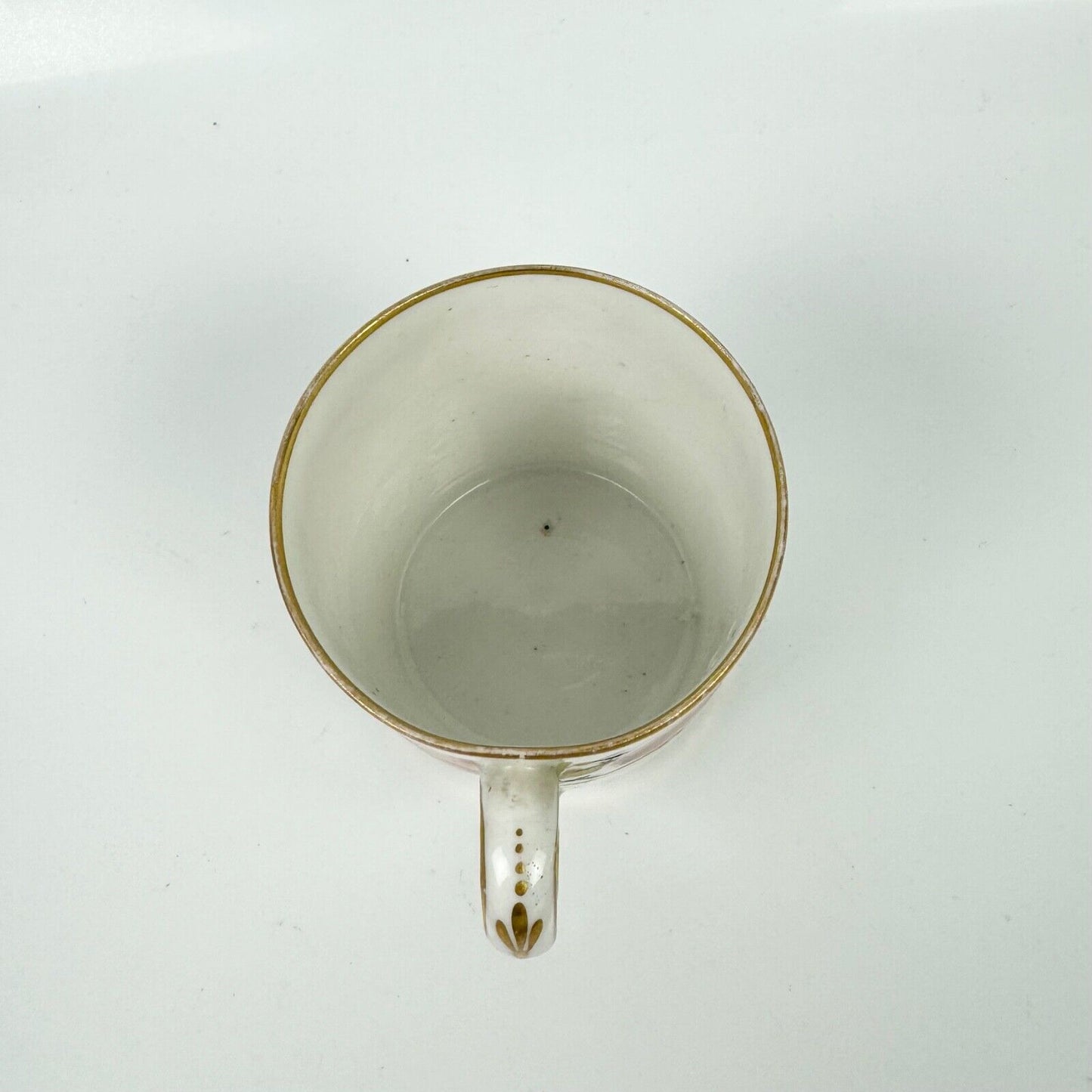 An early 19th century Pinxton coffee can and saucer in pattern 104 circa 1800