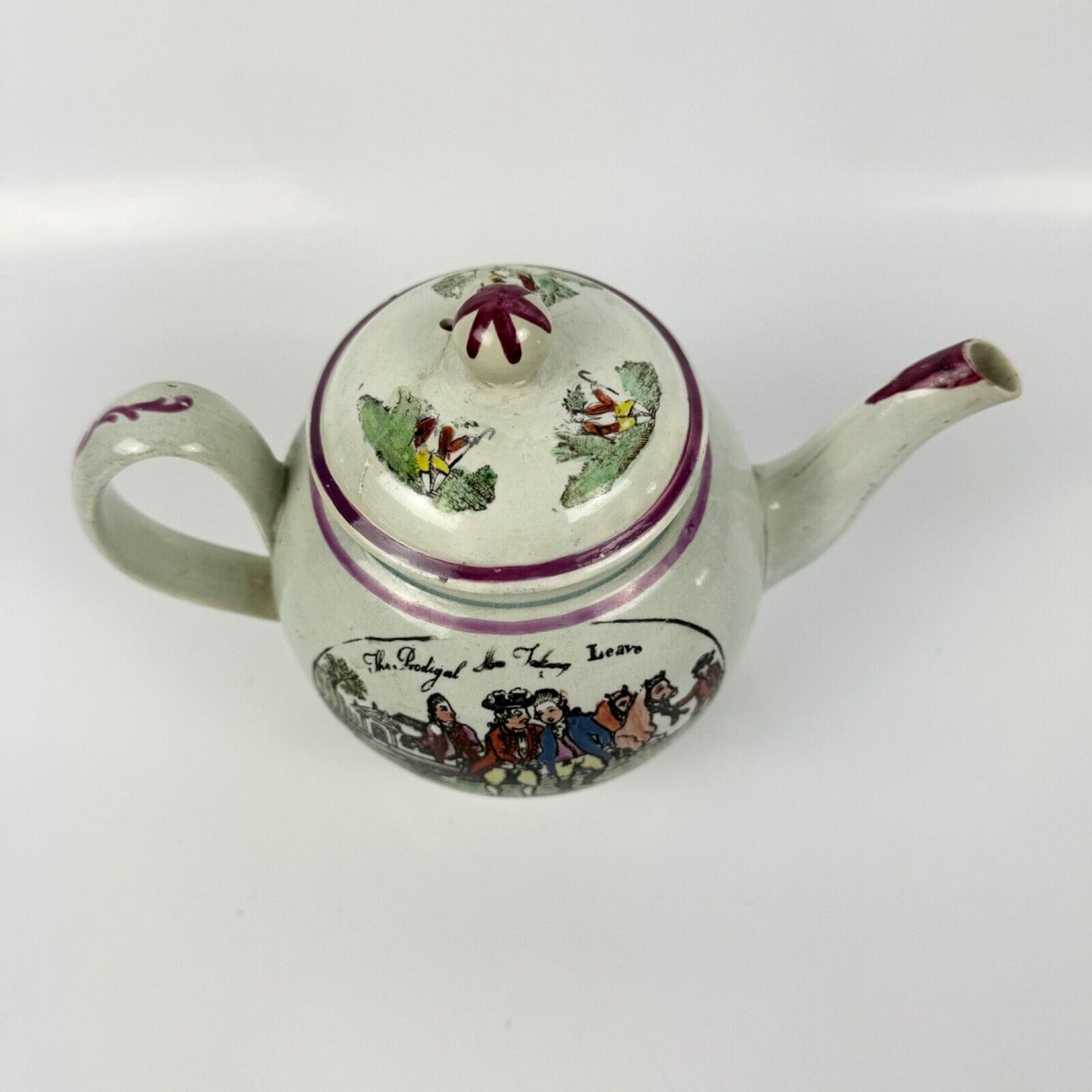 A Staffordshire c1790 " Prodigal Son" pearlware globular teapot.