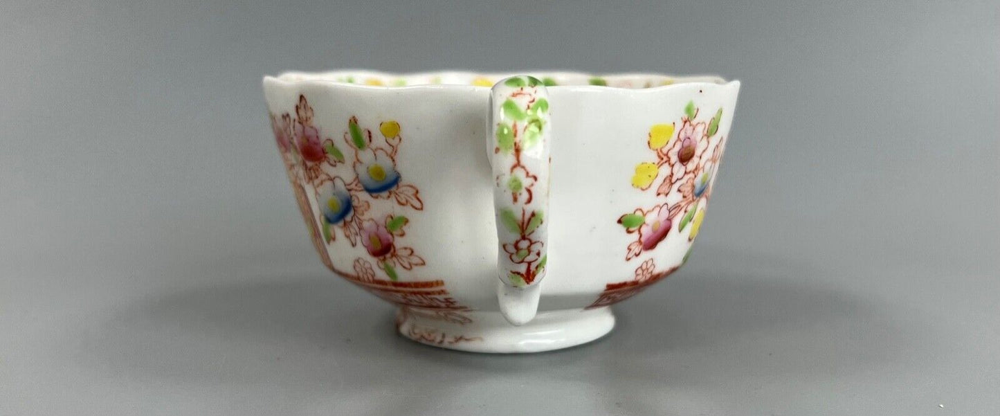 An early 19thc New Hall tea cup and saucer in pattern number 3203