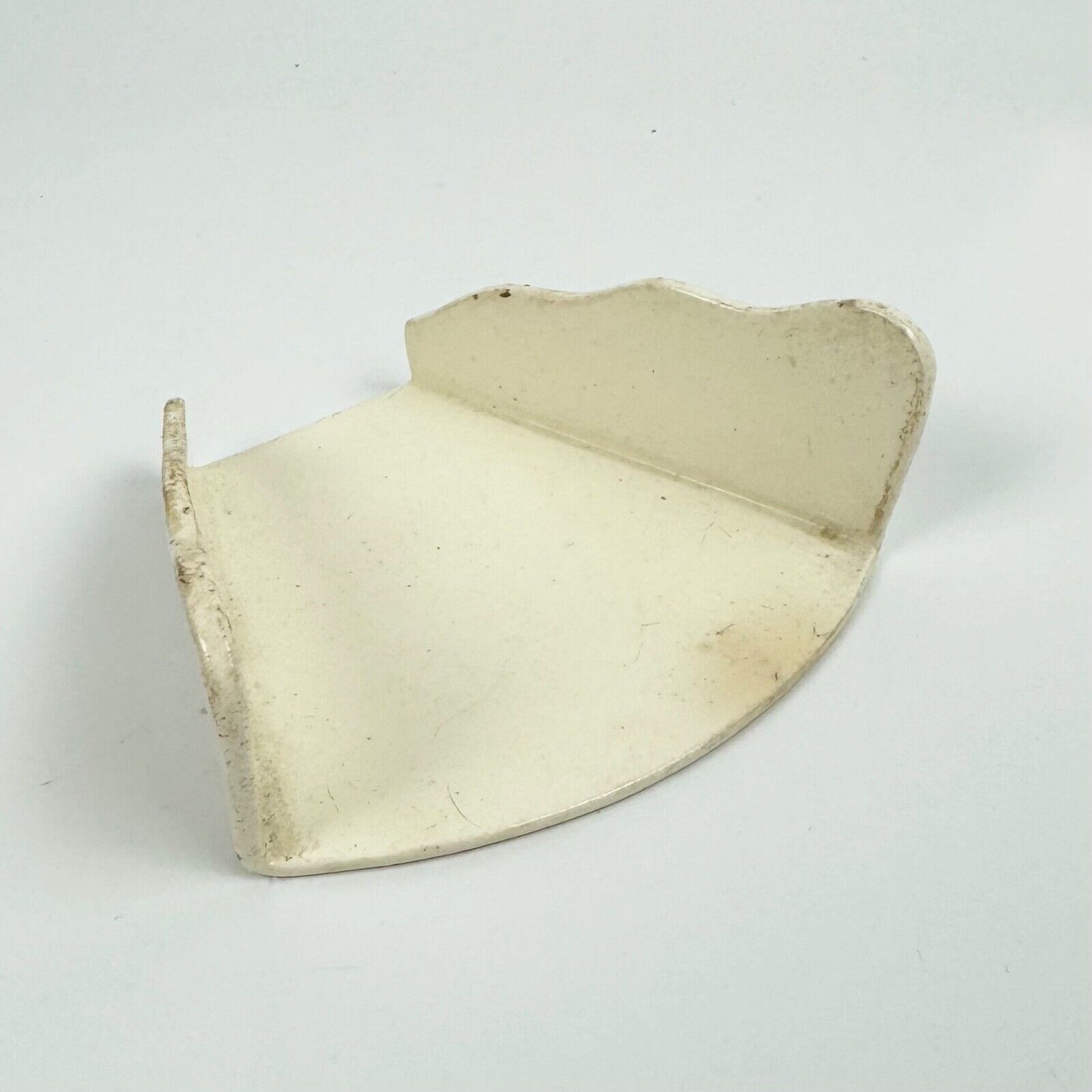 A c.1780-90 creamware asparagus server of trapezoid form with scalloped edges.