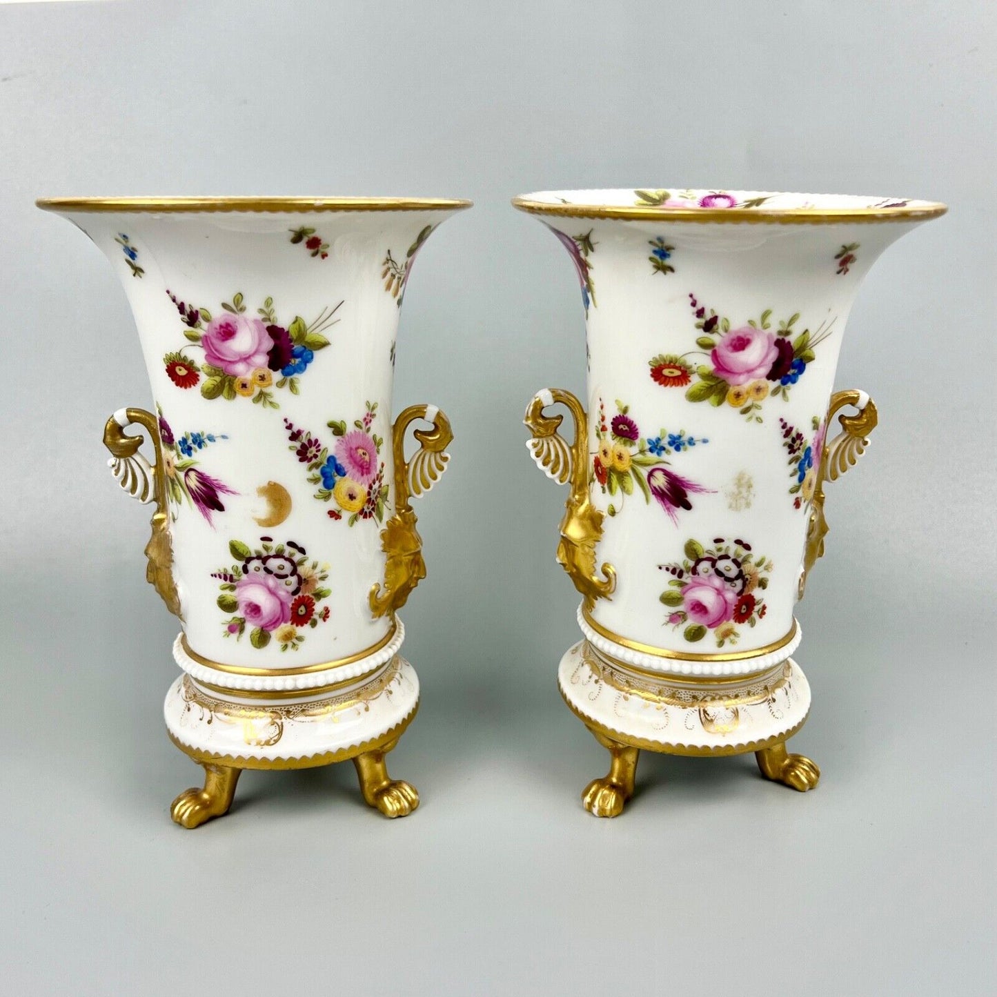 A pair of early 19th century vases in Swansea style c1810