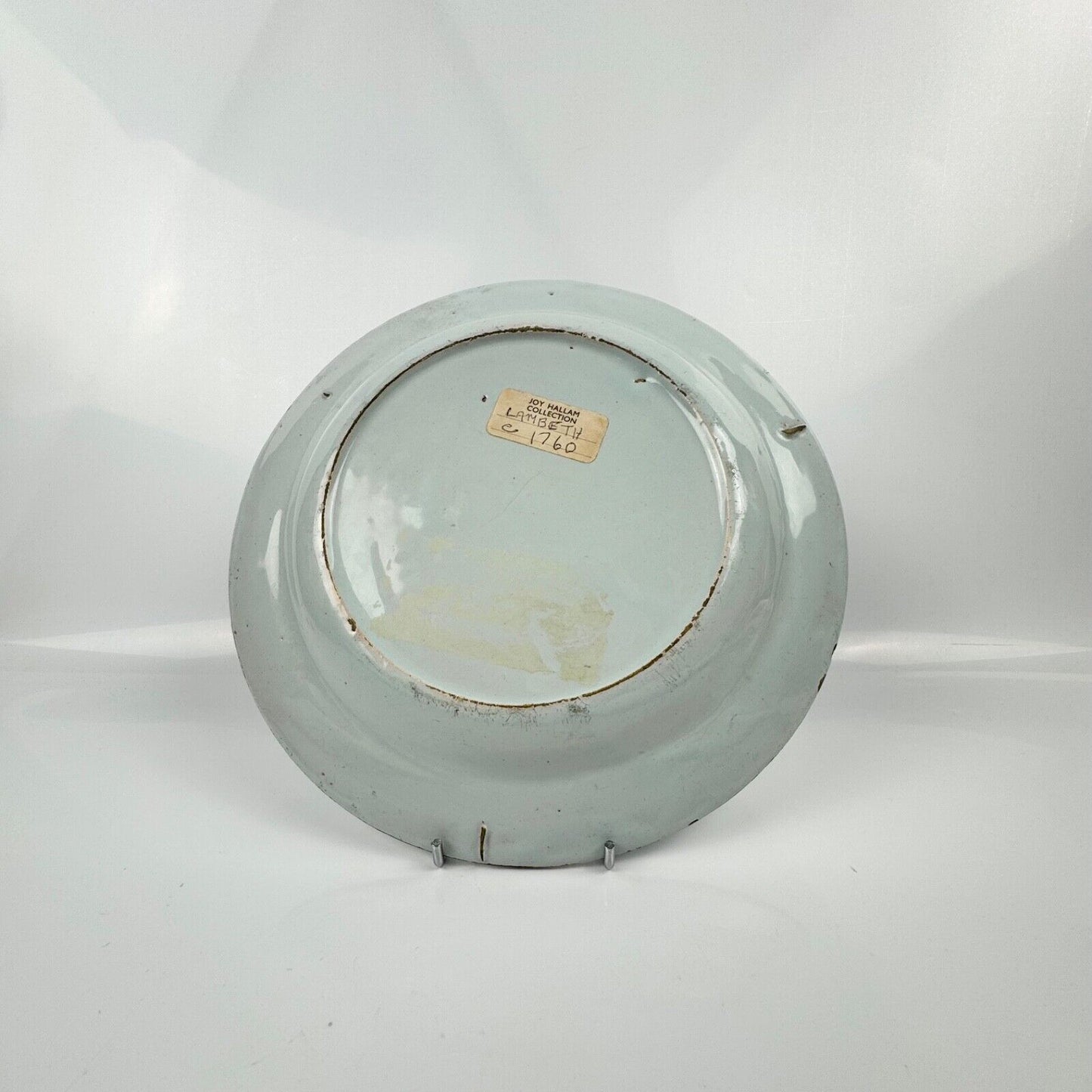 A Lambeth (Abigail Griffiths) delft plate, c.1760, painted in polychrome enamels