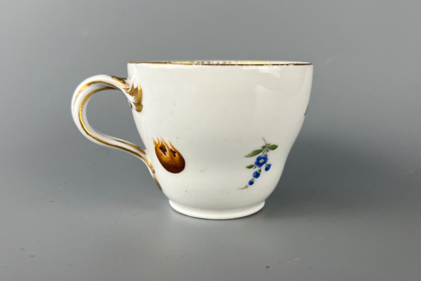 A set of four Meissen Marcolini Period c.1800 bifurcated-handle coffee cups.