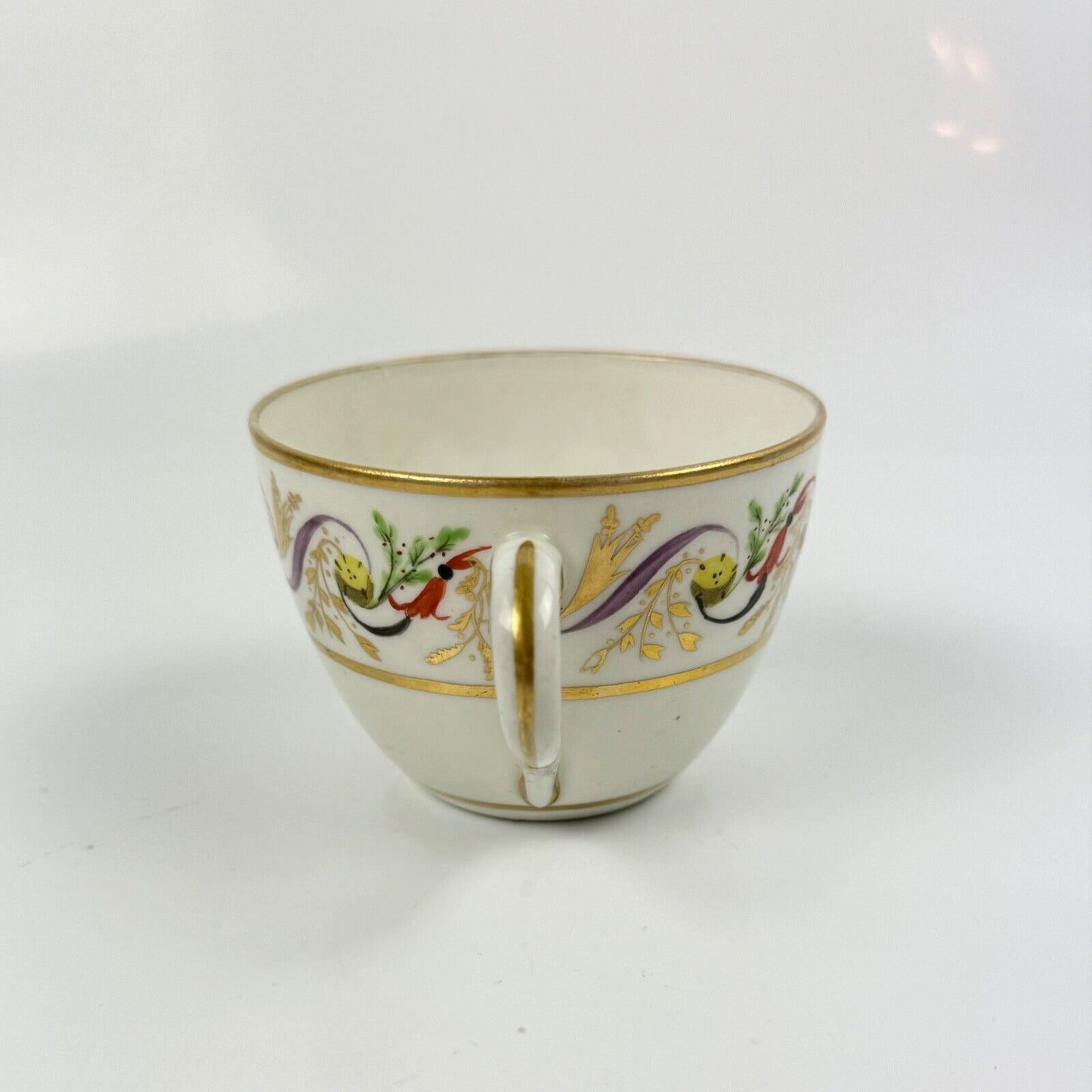 A good Pinxton tea cup and saucer c1796-9 in pattern 301.