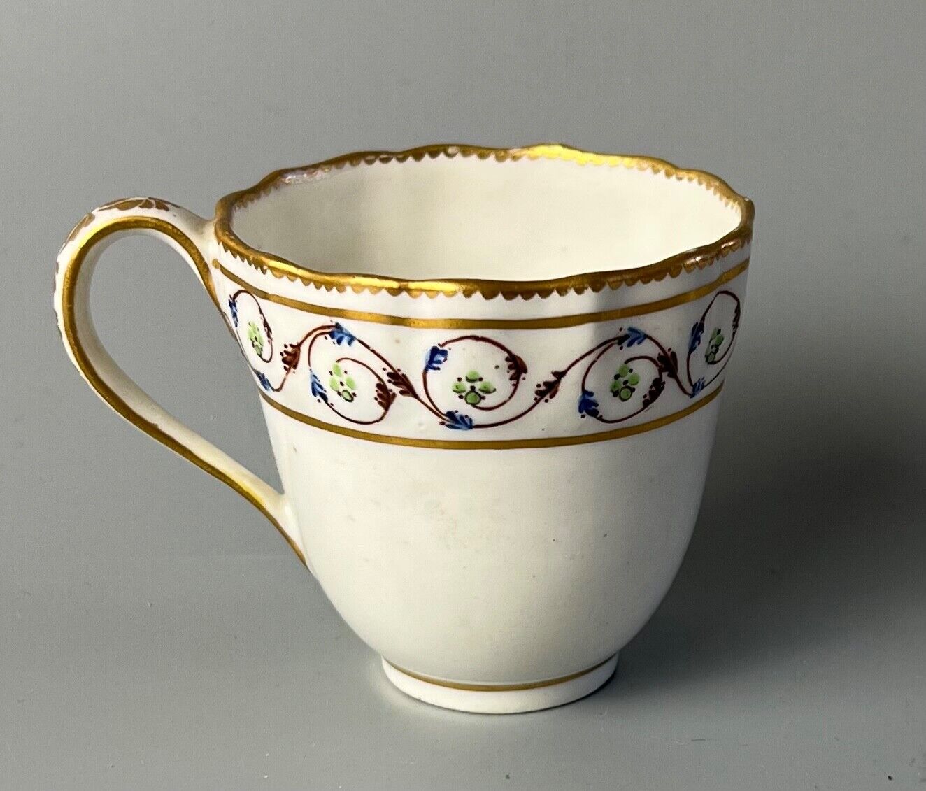 An uncommon Derby scalloped tea bowl and saucer in pattern number 115 c.1784-90