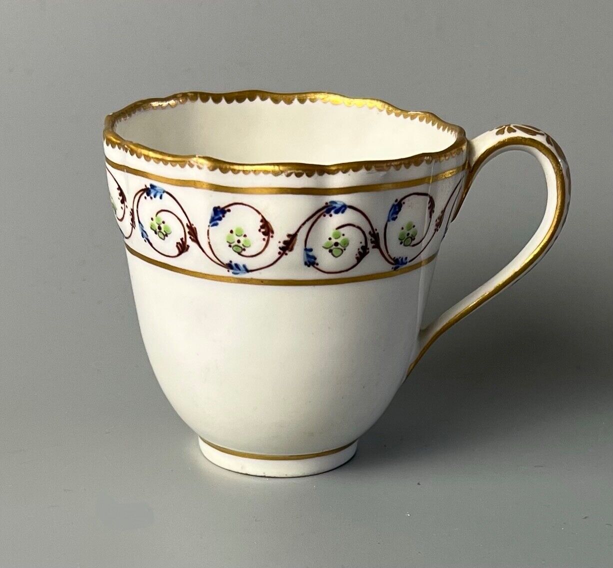 An uncommon Derby scalloped tea bowl and saucer in pattern number 115 c.1784-90
