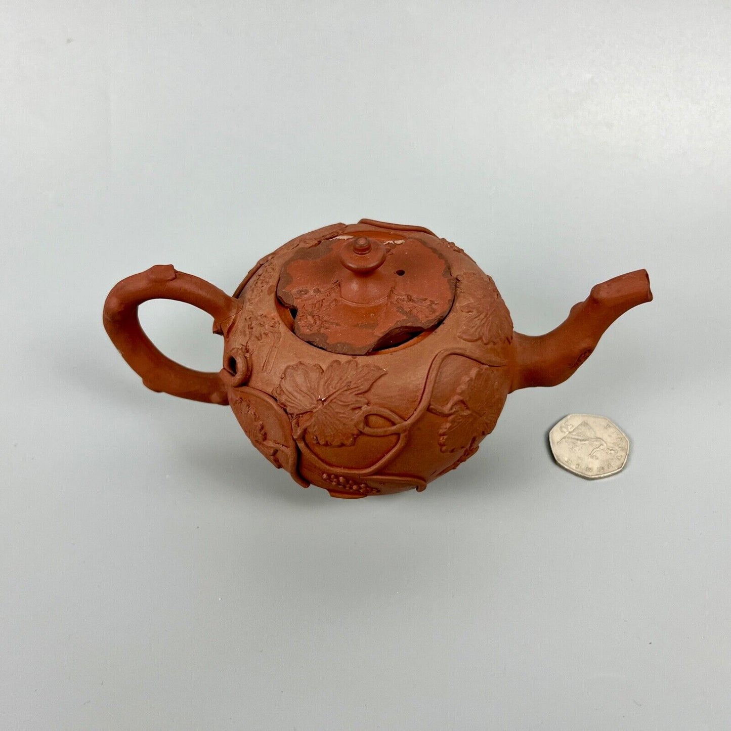 A Diminutive Staffordshire red stoneware teapot with sprigged decoration c.1760