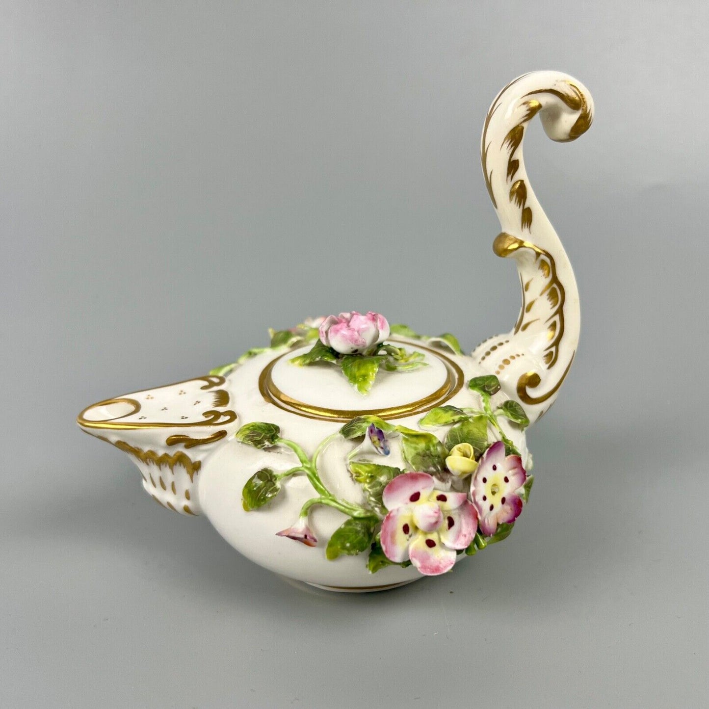 A mid 19thc Derby (Stevenson Hancock-puce version mark) miniature teapot c.1863
