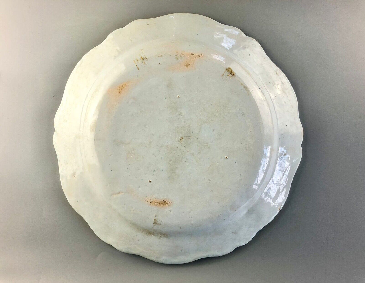 A magnificent and large armorial Rouen faience charger plate. 19thc.