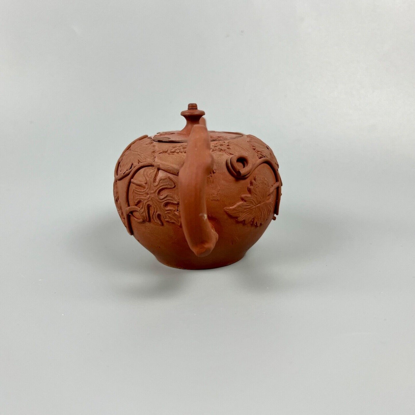 A Diminutive Staffordshire red stoneware teapot with sprigged decoration c.1760