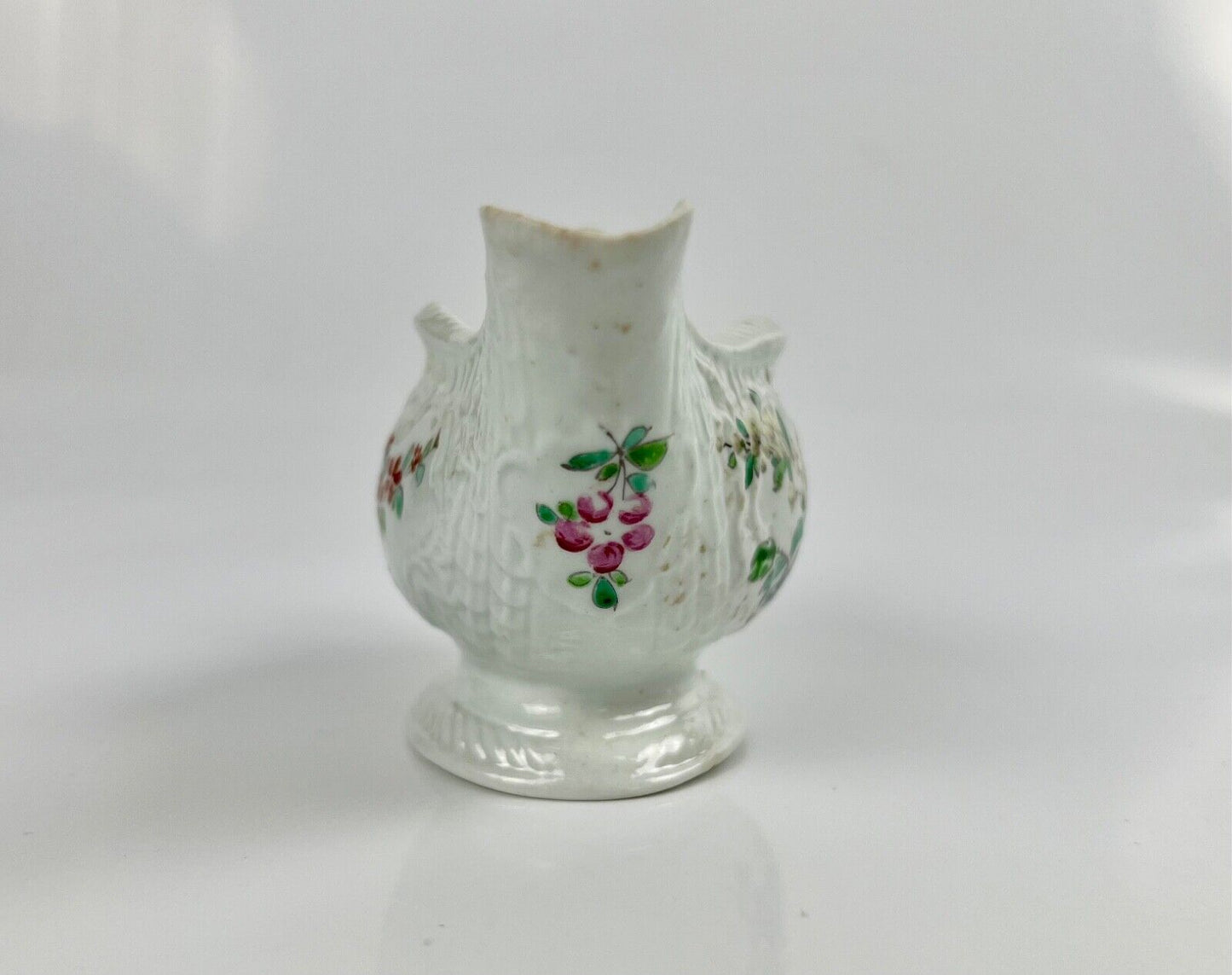 A Philip Christian Liverpool moulded polychrome porcelain sauceboat c.1770