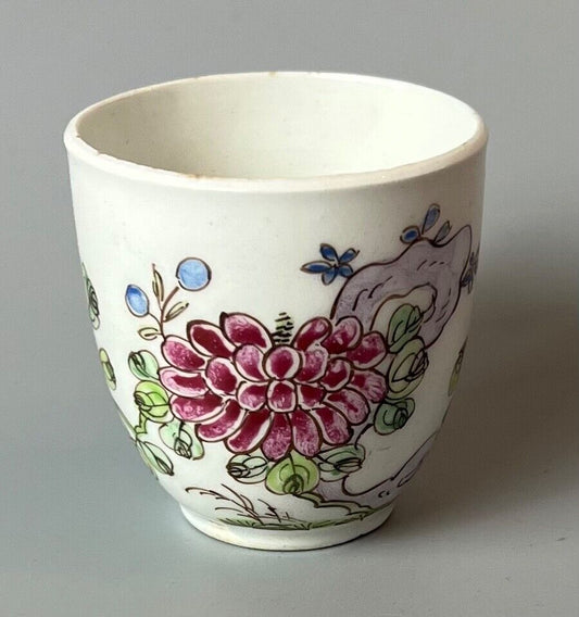 An early Bow coffee cup painted with floral sprays in famille rose stylec.1750-3
