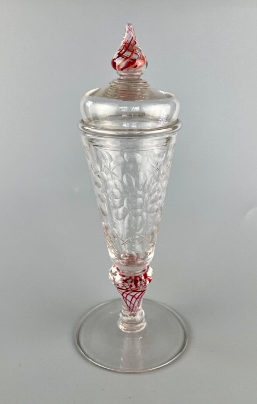 A rare early 18thc. colour twist glass goblet and cover c.1730