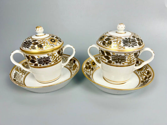 A pair of Chamberlain Worcester chocolate cups, covers and stands c1795