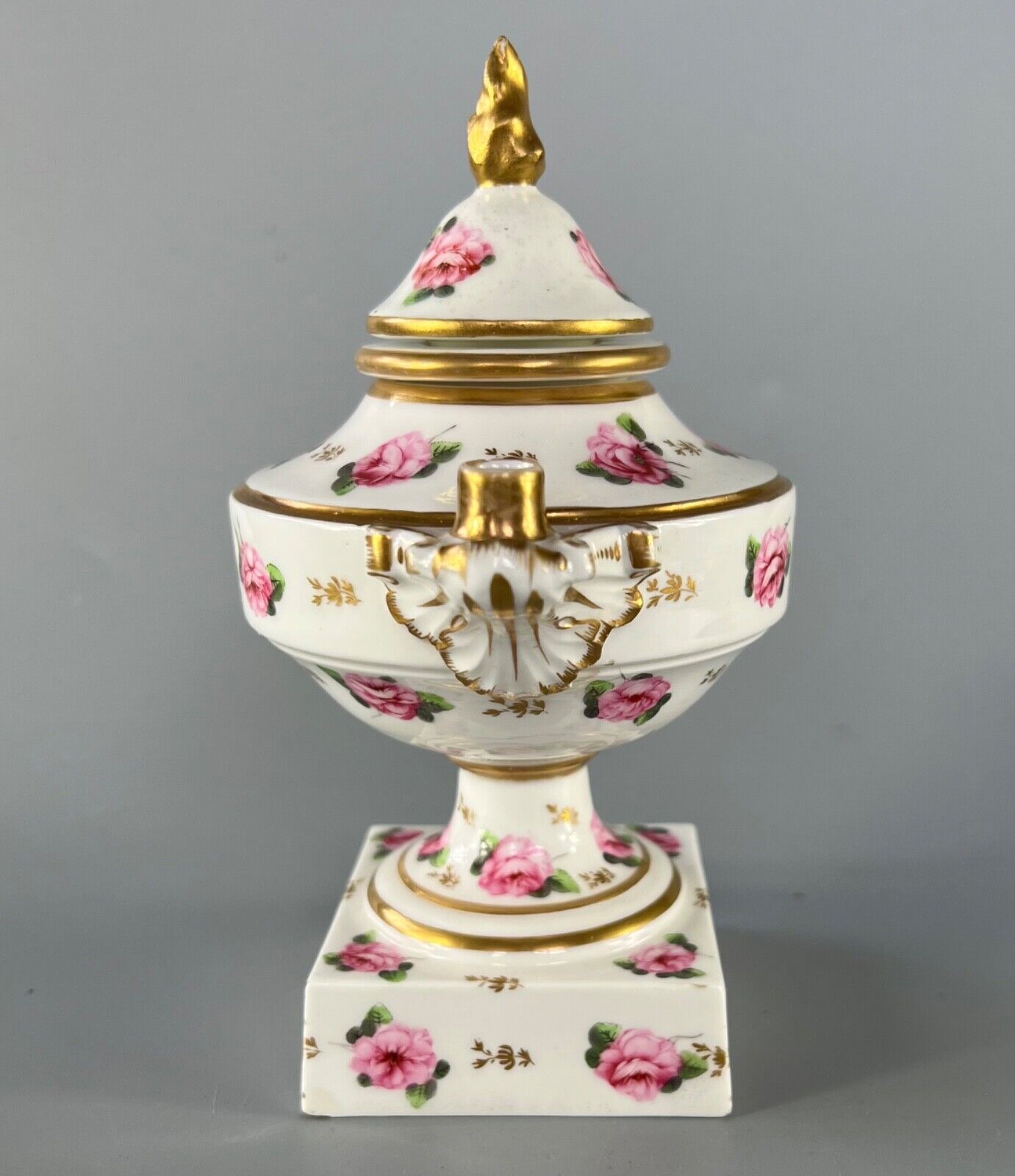An early 19thc Derby inkstand painted with roses c1810-15. Red mark.