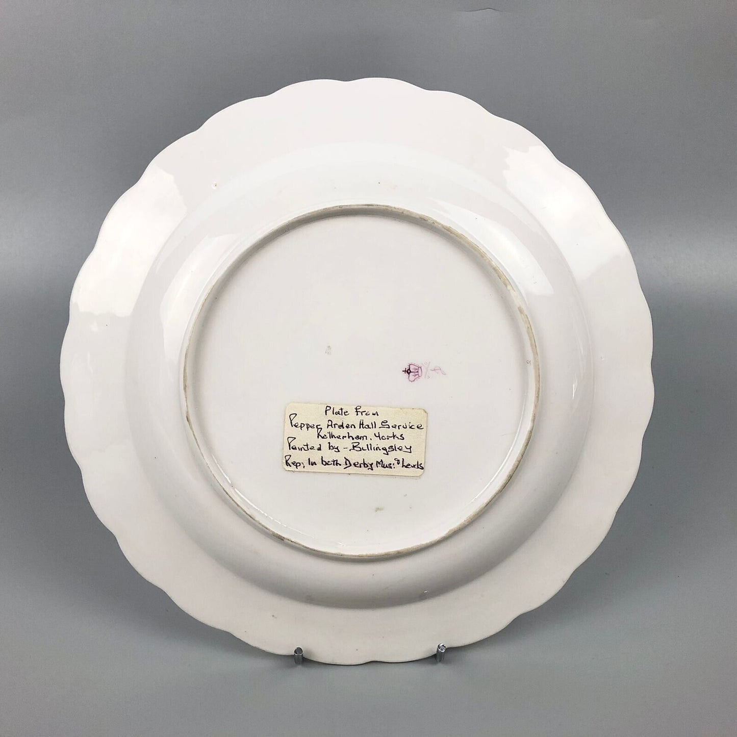 A Derby plate from the Pepper Arden Service painted by William Billingsley c1790