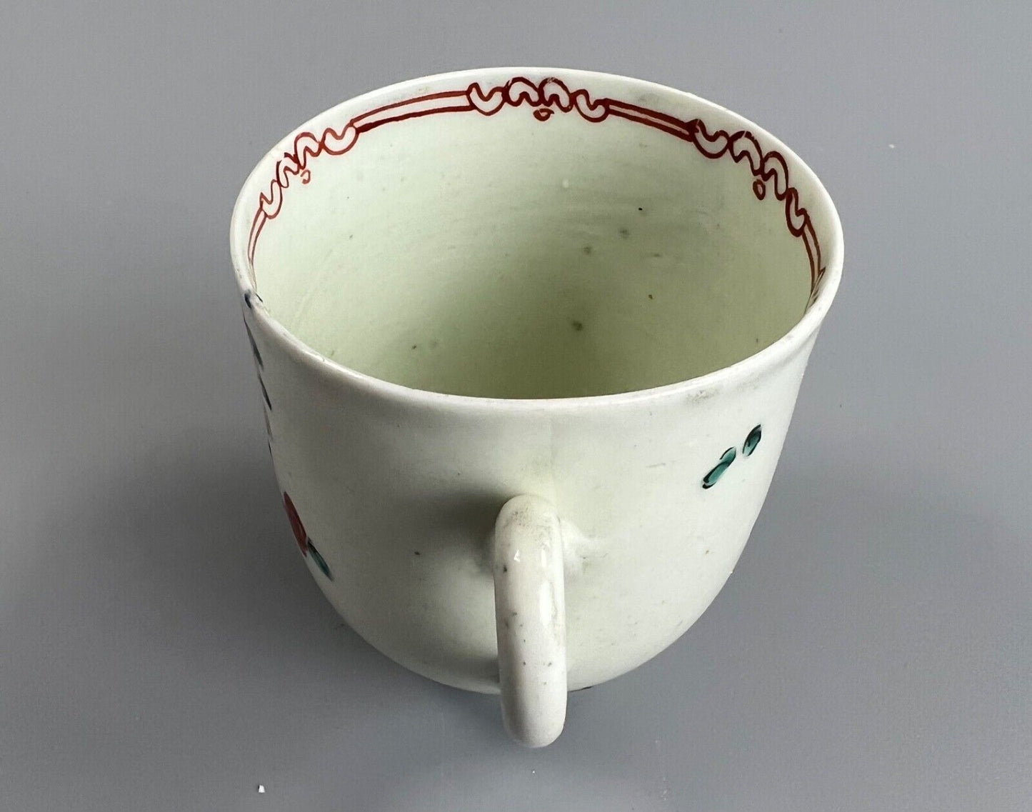 A late 18thc Philip Christian coffee cup painted by the Dot Rose painter #4