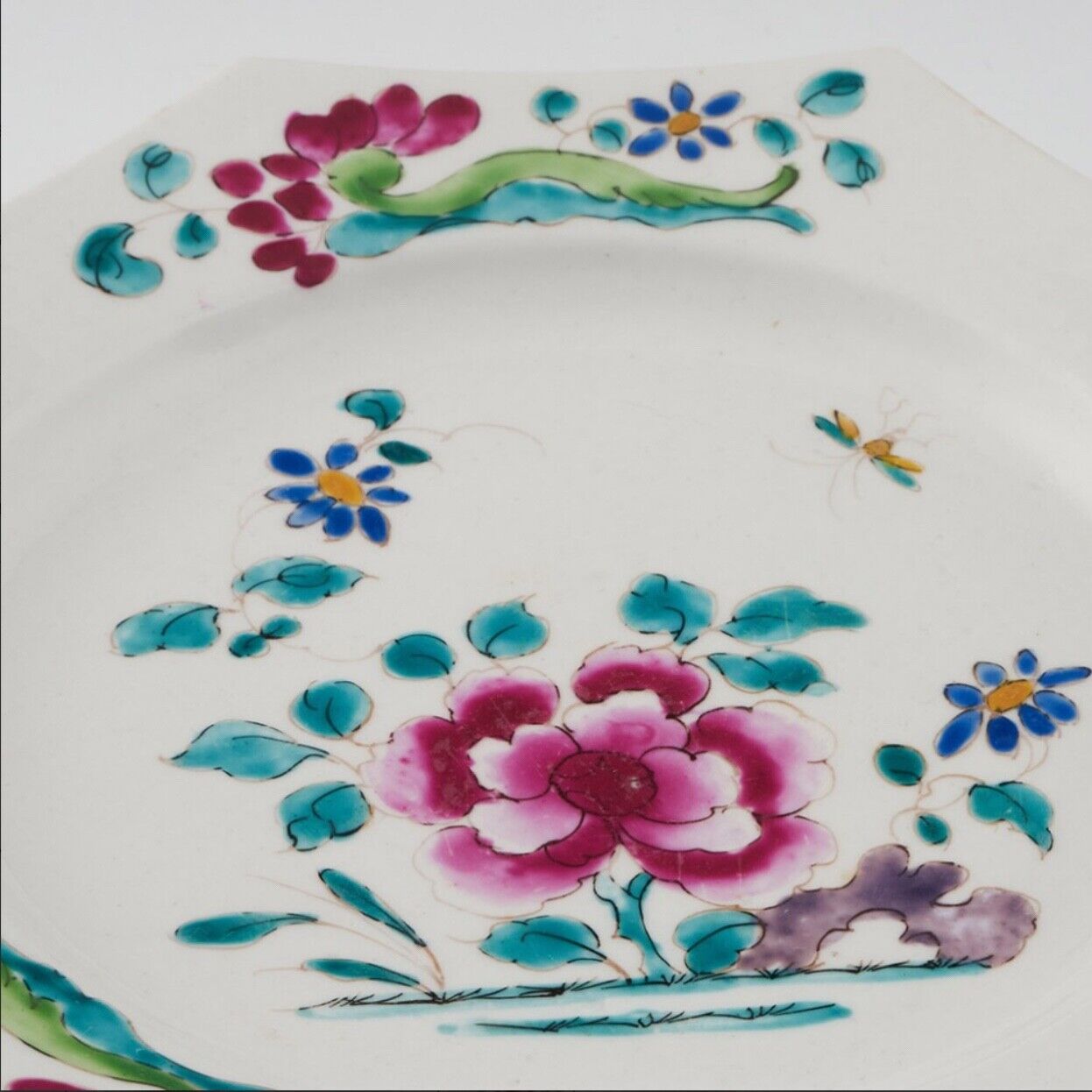 A mid 18thc Bow porcelain octagonal plate in famille rose style c.1752-1755