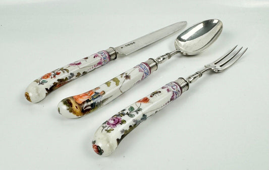 A sterling silver knife fork & spoon set-the silver c.1840, the porcelain c.1760