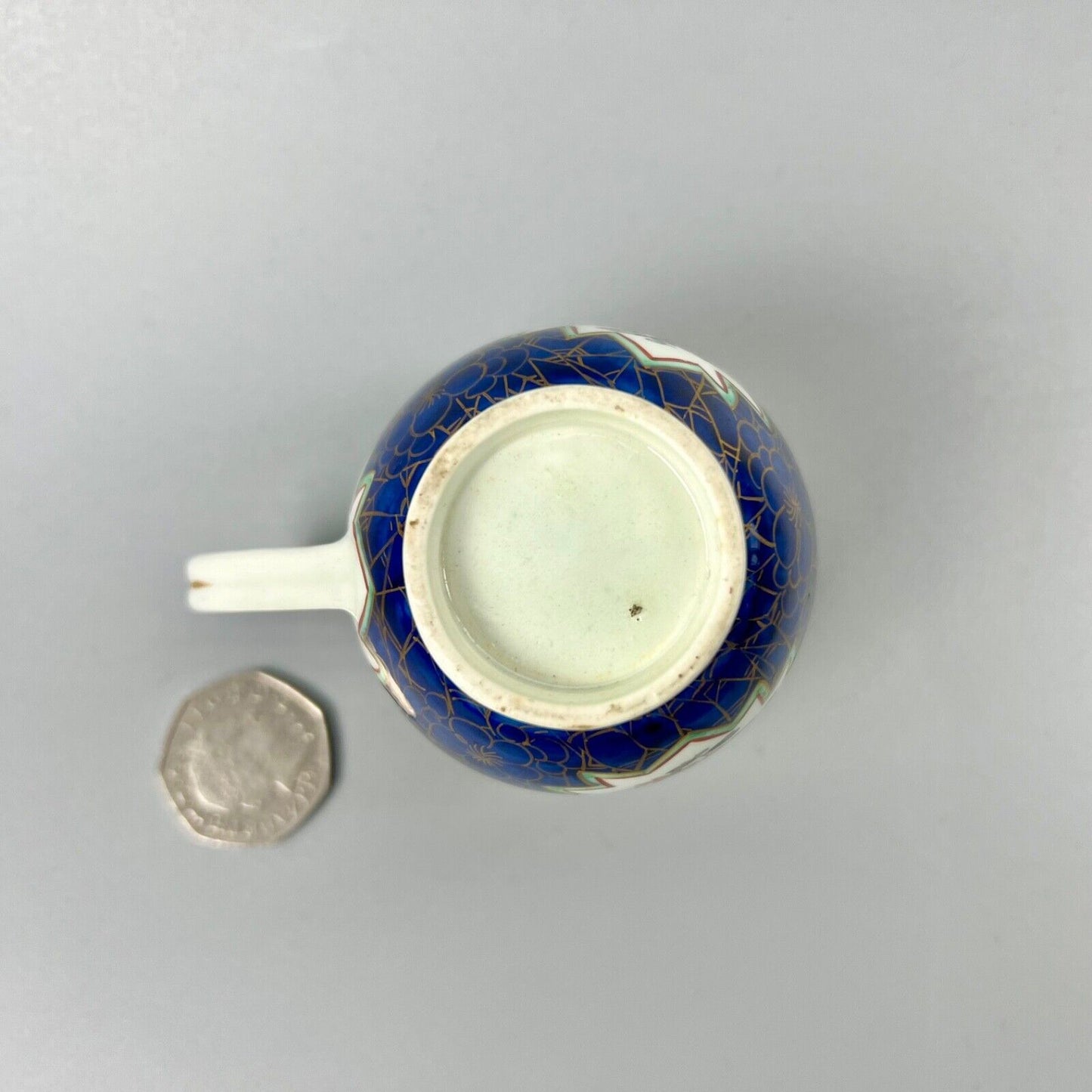 A rare 1st Period Worcester coffee cup in an unusual pattern c.1765-70
