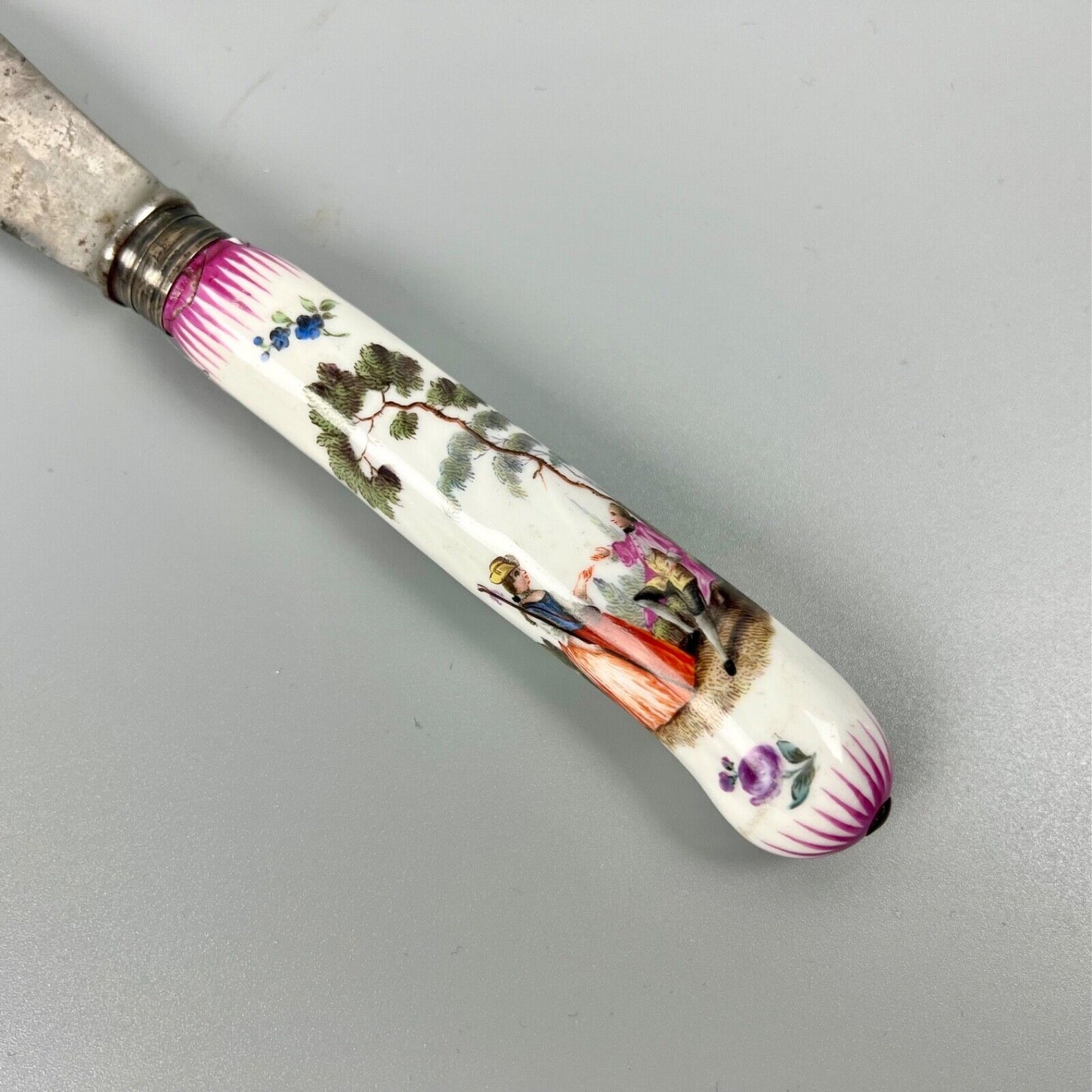 A large German-porcelain-handled steel-bladed dinner knife-the porcelain c.1760.