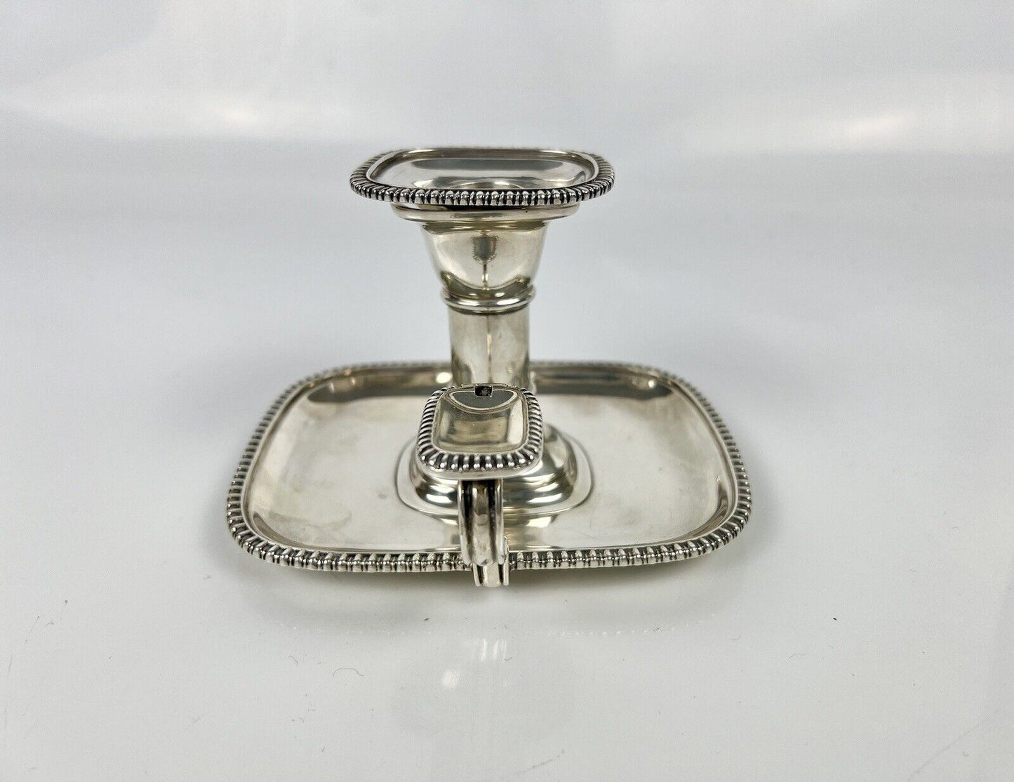 A fine Thomas Bradbury And Son silver chamberstick. London 1913.