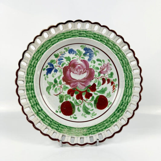A Glamorgan Pottery, Swansea, reticulated and hand-painted plate c.1814-20