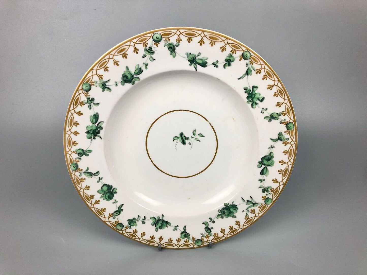 A Chelsea-Derby plate.  Probably a replacement for a Bristol service. c.1775