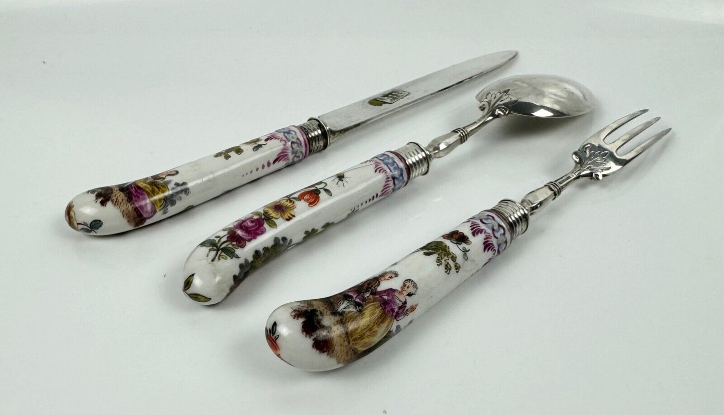 A sterling silver knife fork & spoon set-the silver c.1840, the porcelain c.1760