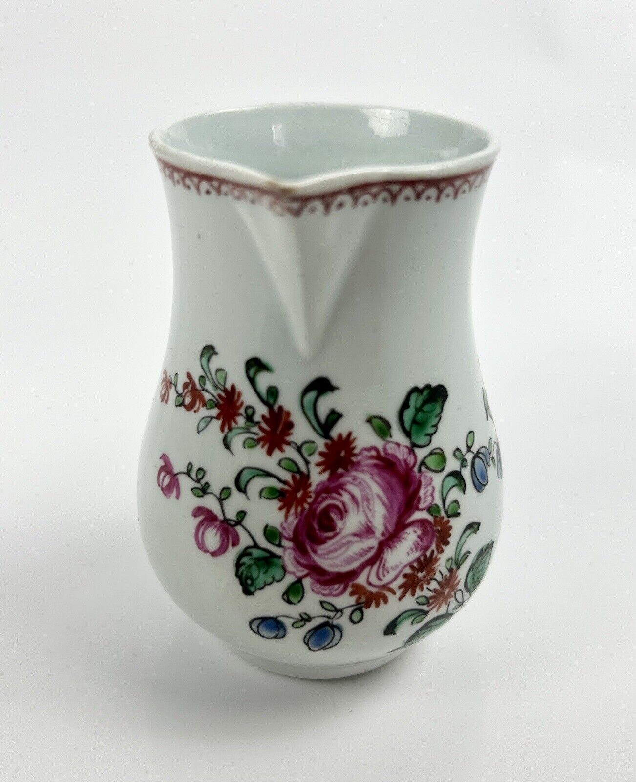 A Philip Christian Liverpool floral-decorated sparrowbeak jug. c.1770
