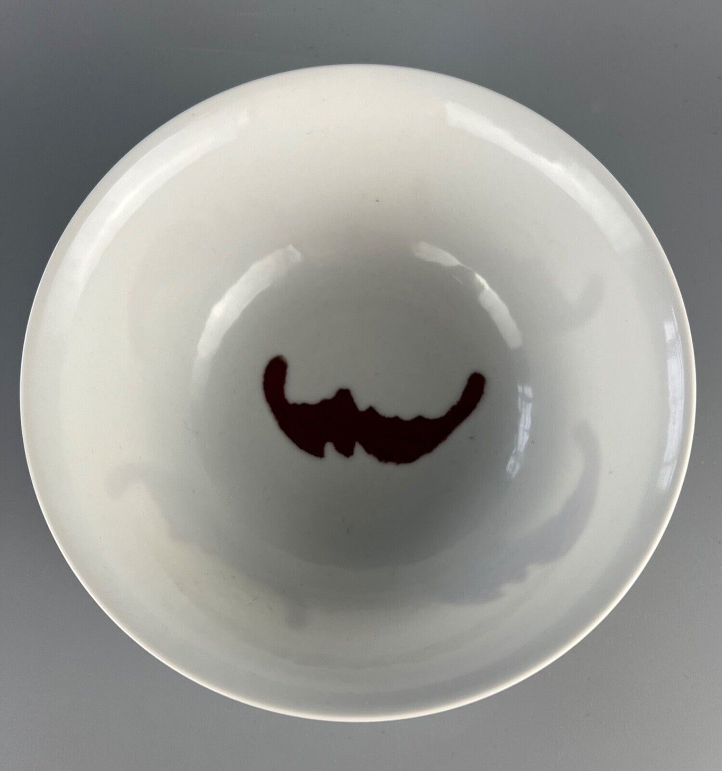 A finely potted 20thc Chinese porcelain "Four Bats" bowl.