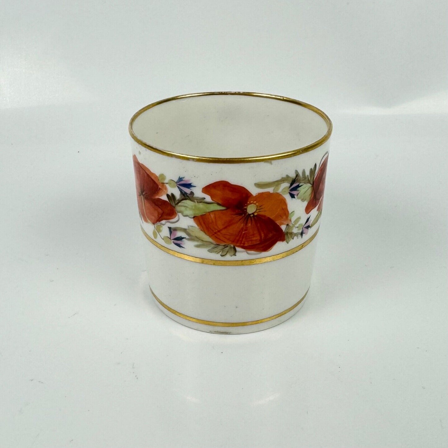 An early 19th century Pinxton coffee can and saucer in pattern 104 circa 1800