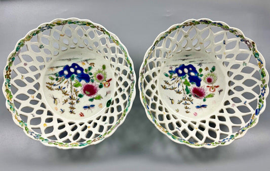A pair of large Bow porcelain famille rose reticulated baskets c.1752