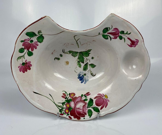 A Strasbourg French Faïence polychrome floral painted barber's bowl. c1790-1820
