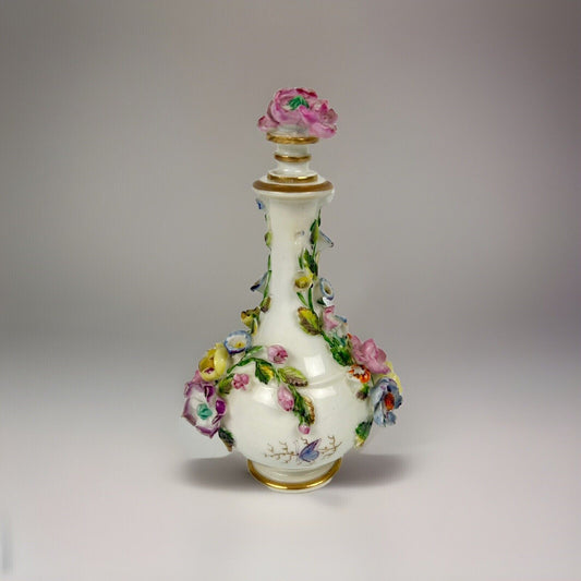 Rockingham porcelain flower encrusted tapered scent bottle. Puce Mark. c.1831-7