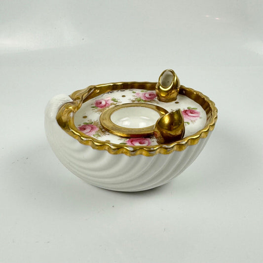 A fine shell-shaped Swansea inkwell and liner painted with roses c1814-26