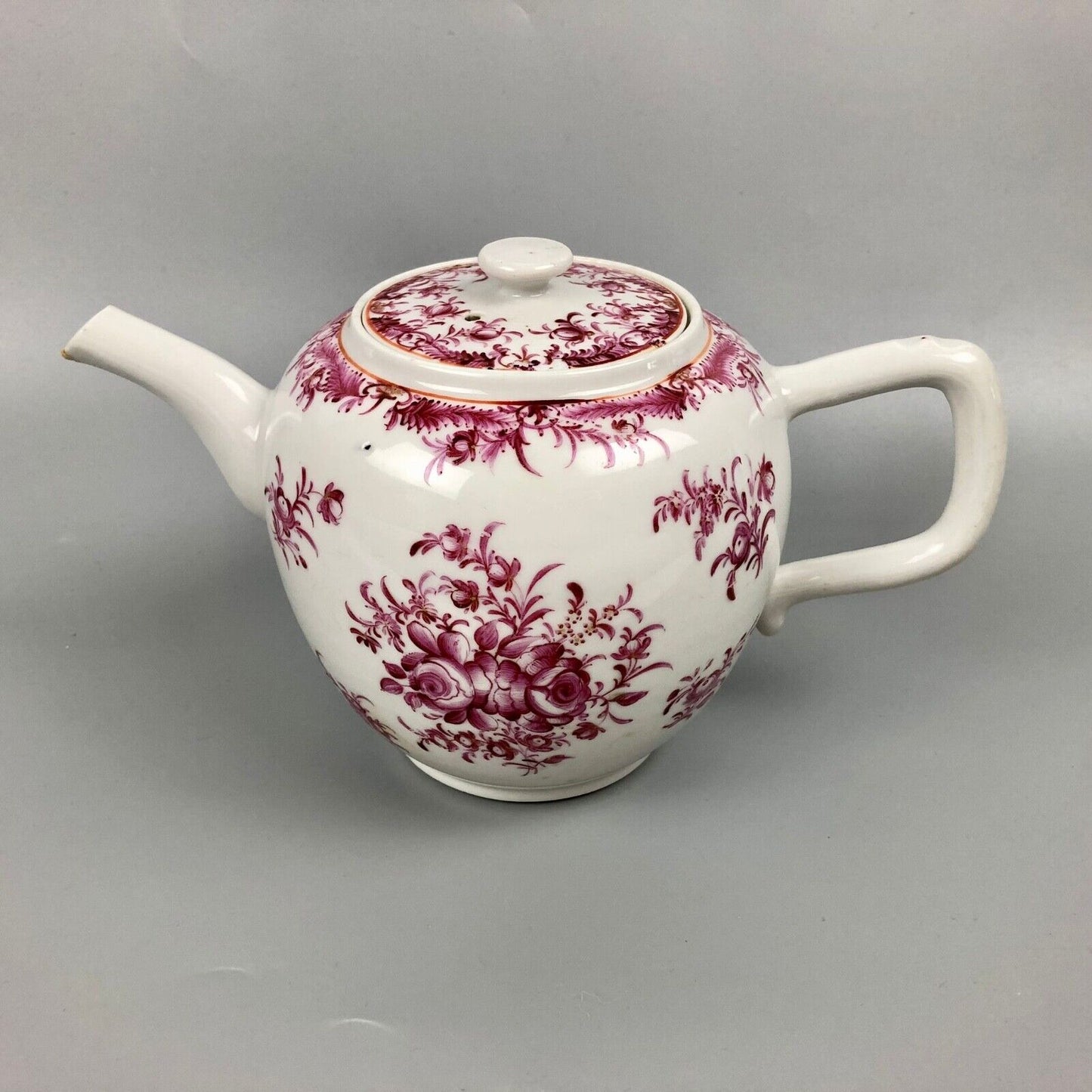 An 18thc Qianlong Period Chinese famille rose teapot painted  with puce flowers
