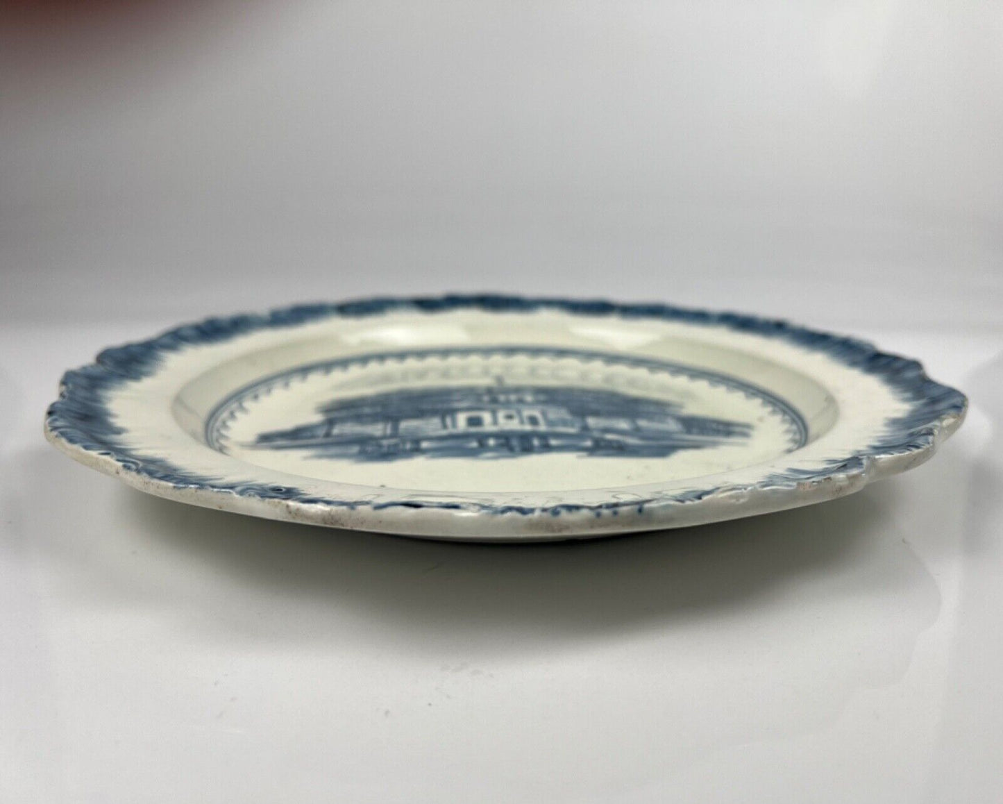 A pearlware plate c1790, painted with a chinoiserie pagoda scene. Leeds/Staffs
