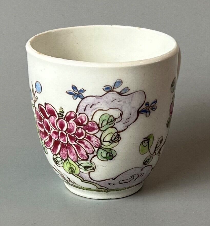 An early Bow coffee cup painted with floral sprays in famille rose stylec.1750-3
