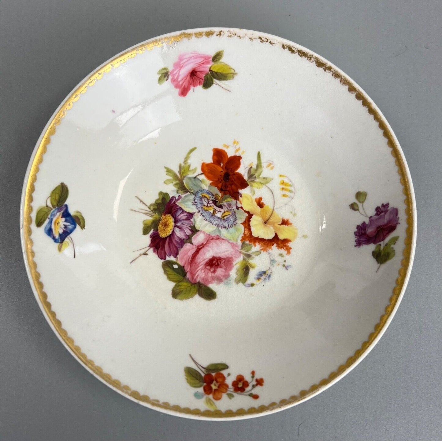 A lovely early 19thc Derby saucer painted by Moses Webster. c.1820-5