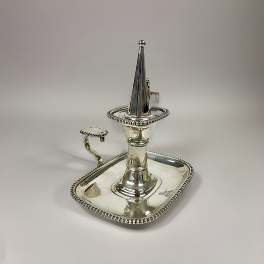 A fine Thomas Bradbury And Son silver chamberstick. London 1913.