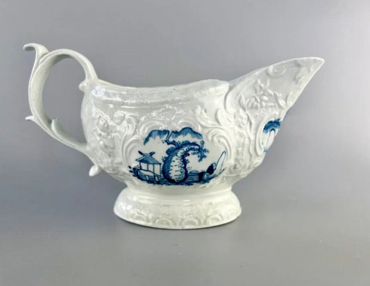 Christian Liverpool porcelain moulded sauceboat with oriental decoration. c.1770