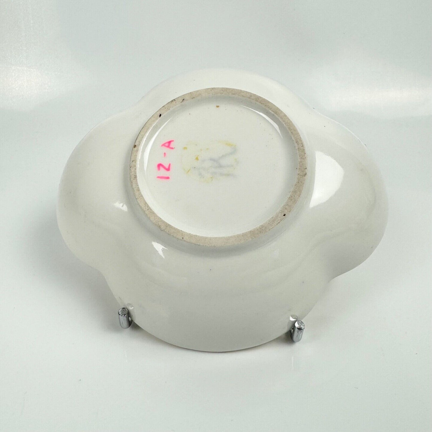 Dresden quatrefoil teacup & saucer painted with romantic scenes. 'AR' mark c1880