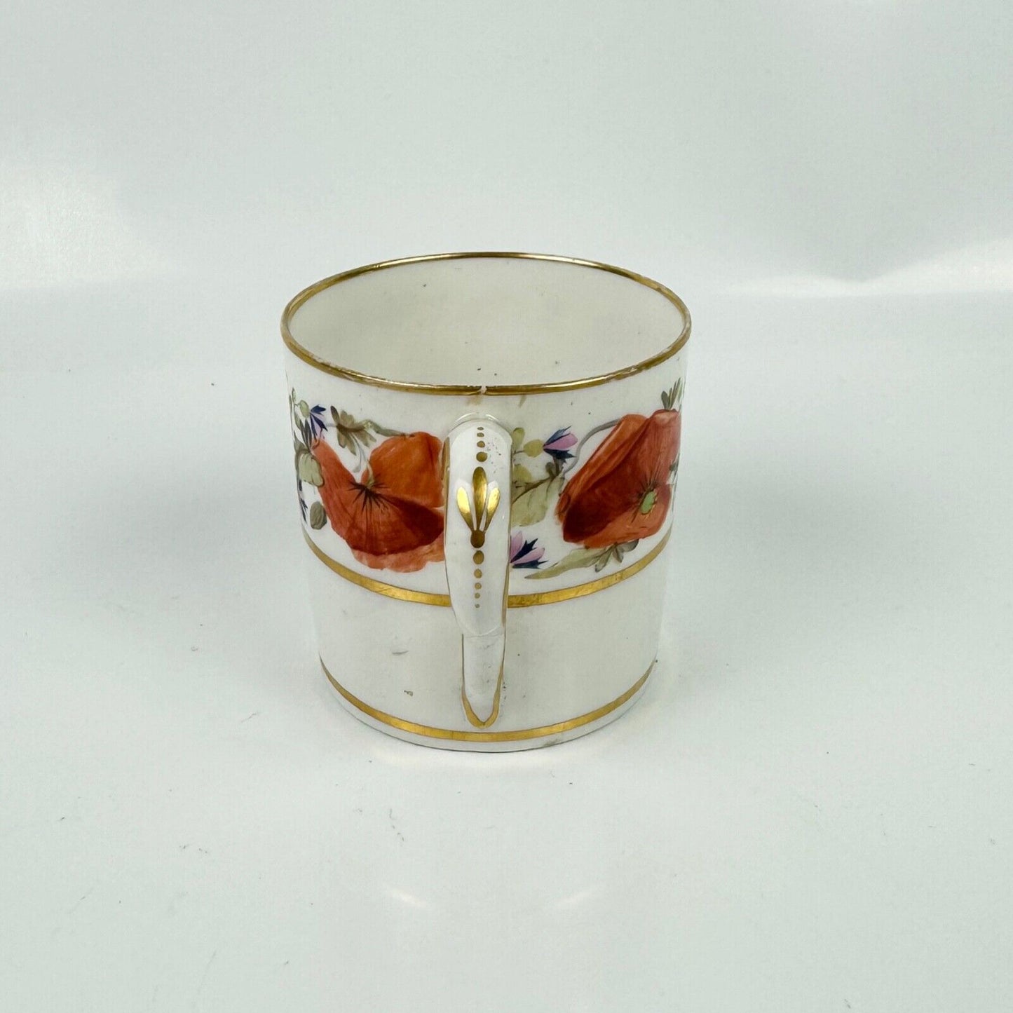 An early 19th century Pinxton coffee can and saucer in pattern 104 circa 1800