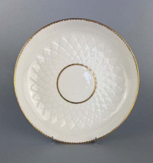 An artichoke-moulded 18thc Derby saucer dish. Puce Derby mark.