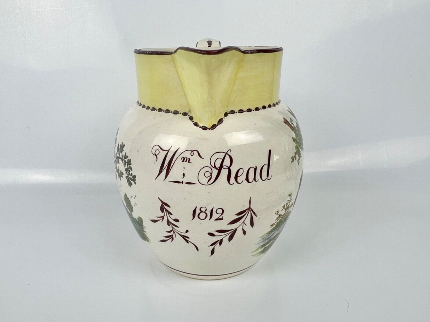 Creamware dated jug printed and painted with a dog and birds. c.1812, 'Wm Read'