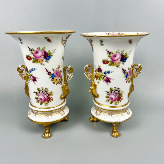 A pair of early 19th century vases in Swansea style c1810